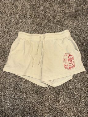 Cream Drawstring Athletic Shorts with Red Graphic
